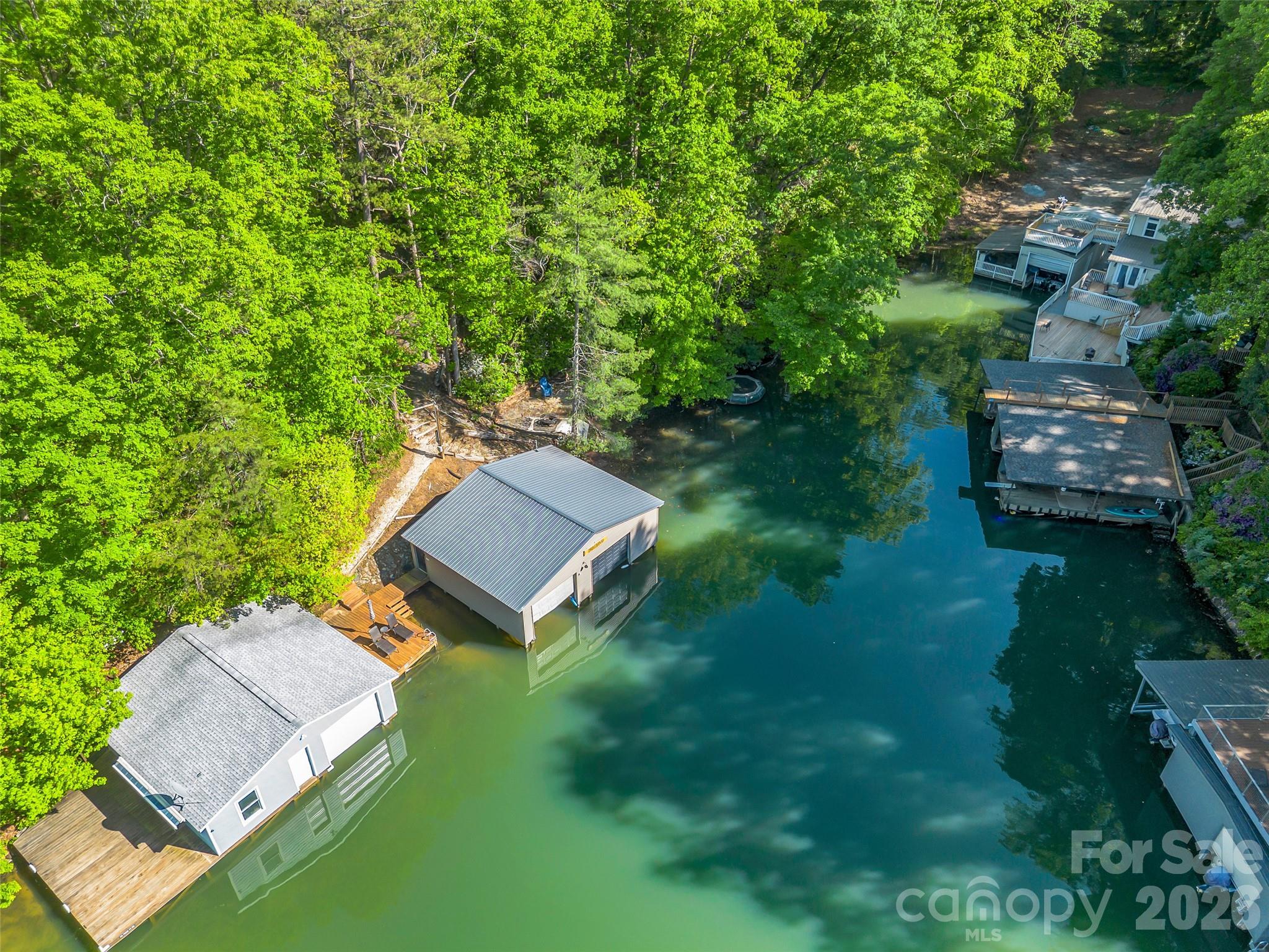 139 Picnic Point Road Lake Lure, NC 28746 - Photo 40 of 41 an aerial view of a house with a yard