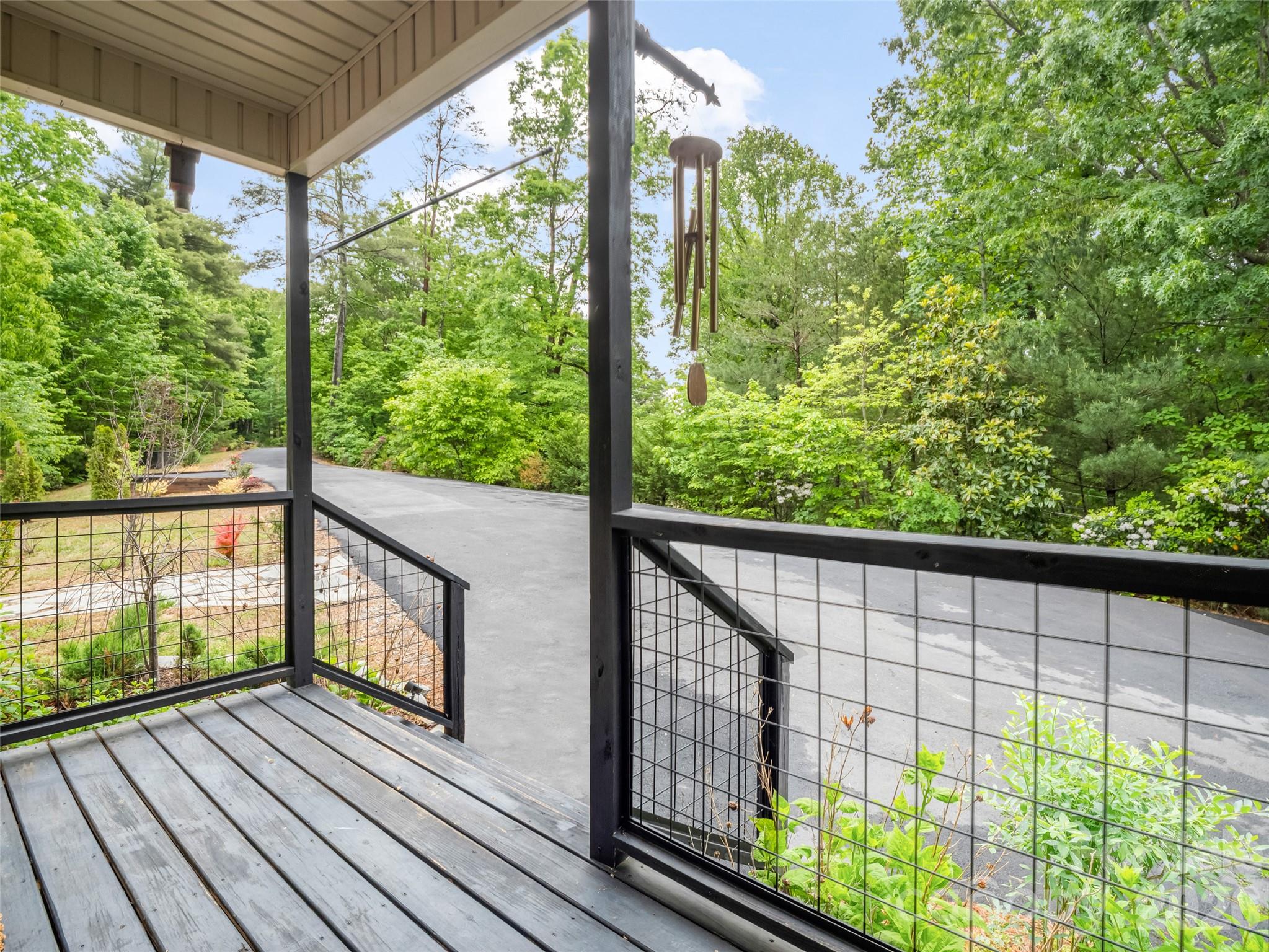 139 Picnic Point Road Lake Lure, NC 28746 - Photo 7 of 41 a view of a balcony with wooden floor