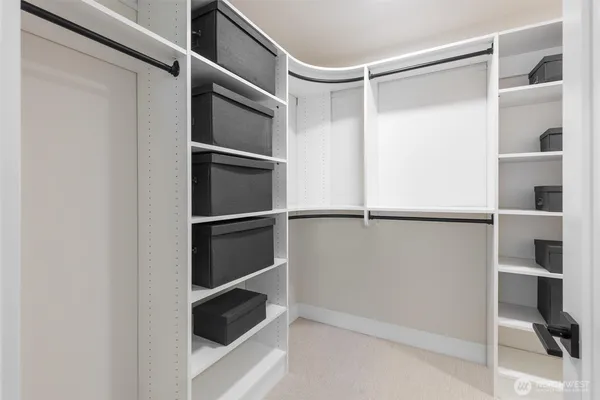 a view of an empty walk in closet