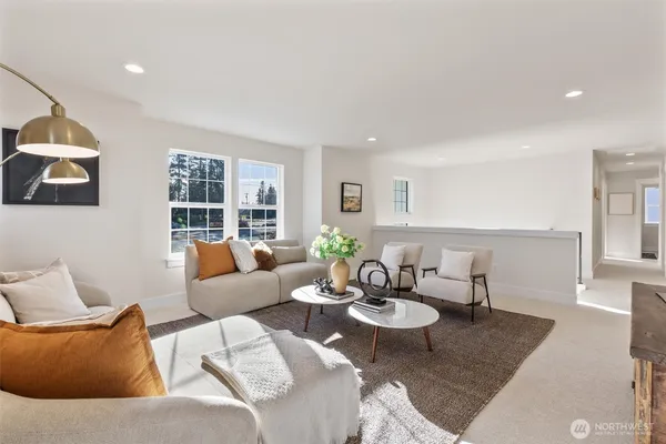 a living room with furniture and a table