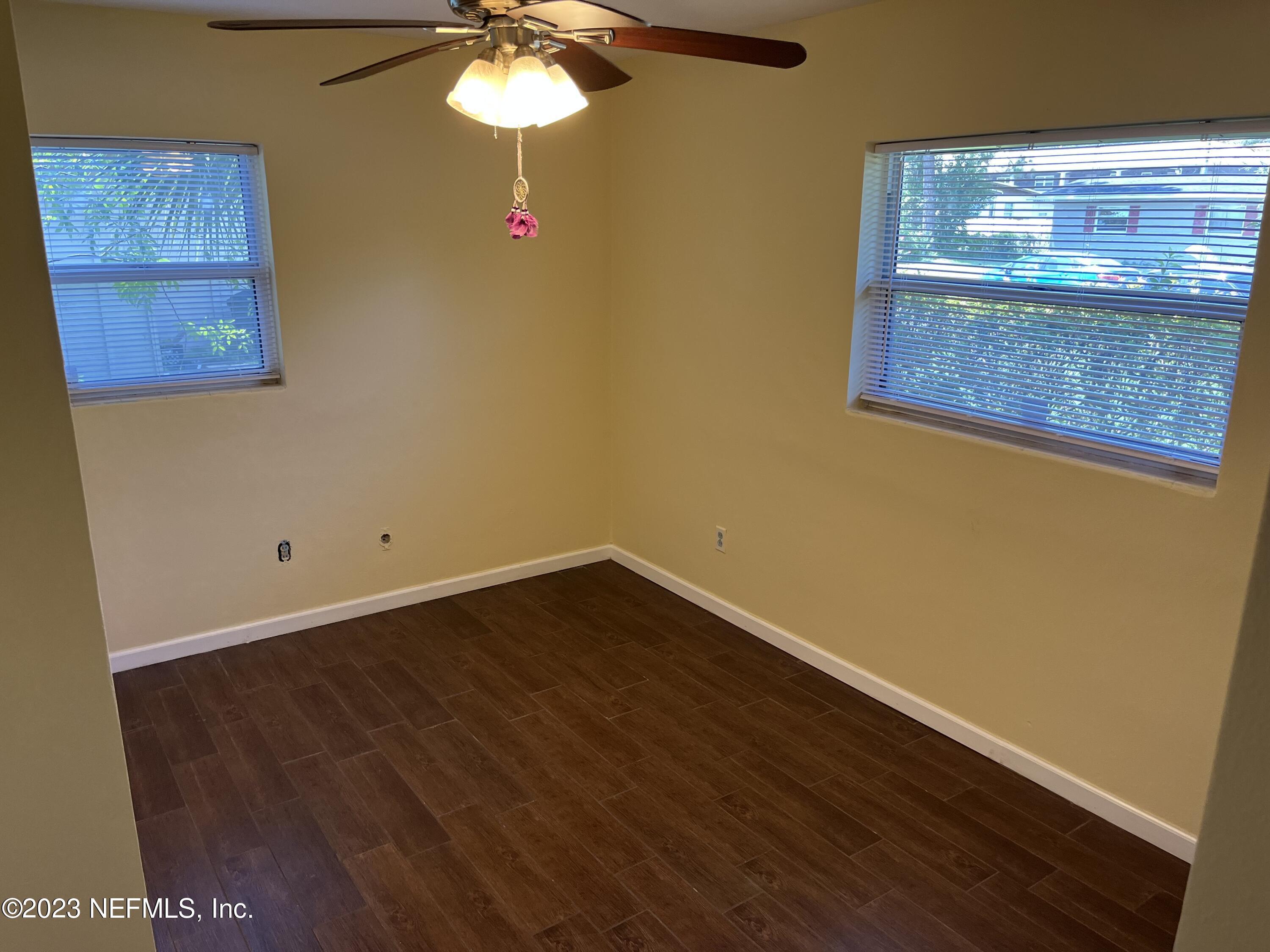 5418 Juno Drive Jacksonville, FL 32207 - Photo 11 of 19 a view of a small space with wooden floor