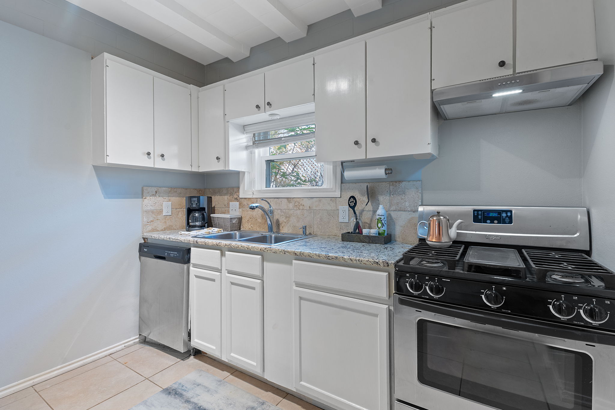 4611 Rosedale Avenue Austin, TX 78756 - Photo 24 of 35 The back unit kitchen's functional layout supports easy daily living for whoever calls this space home — whether that's a tenant, an adult child, or an in-law.