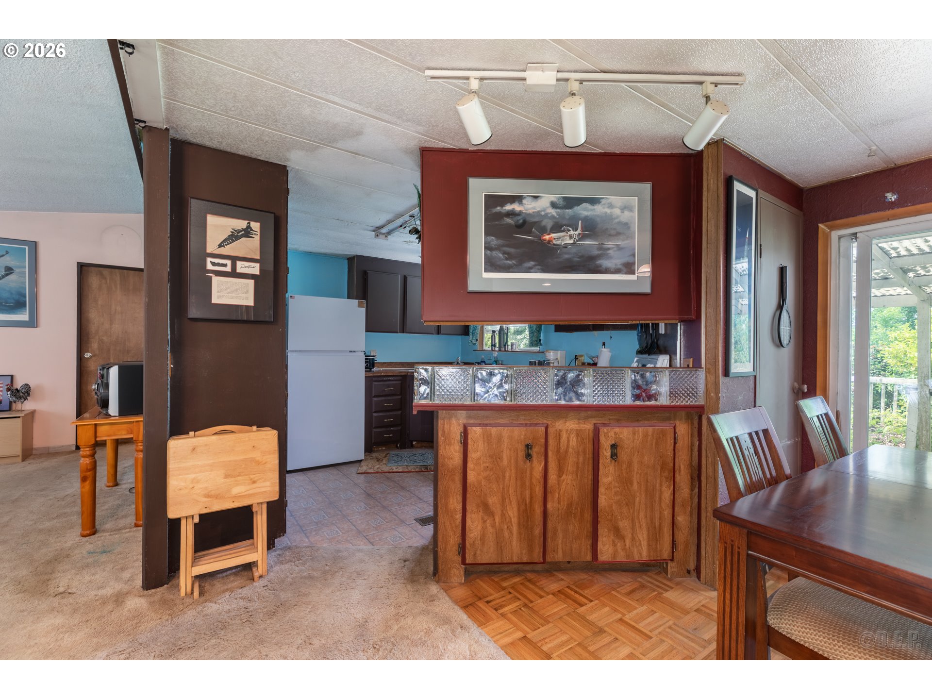 66971 Maplecrest Road Deer Island, OR 97054 - Photo 10 of 24 a living room with furniture and a flat screen tv