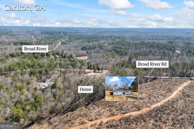 a kitchen with a stove and a microwave