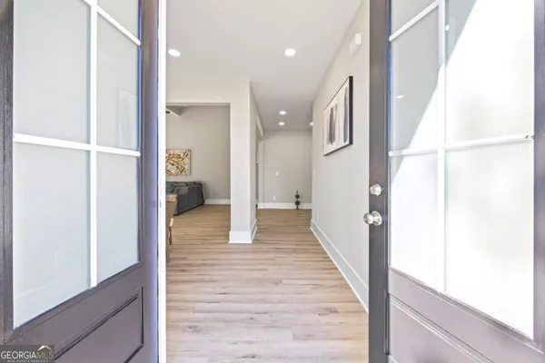 a bedroom with bed and window