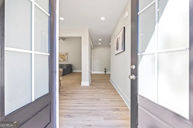 a bedroom with bed and window