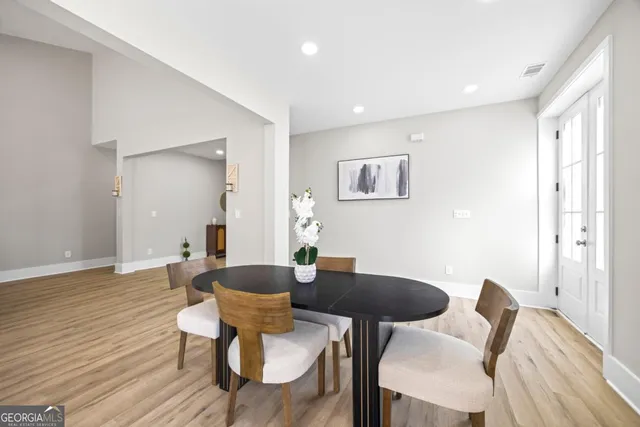 a bathroom with a double vanity sink mirror and