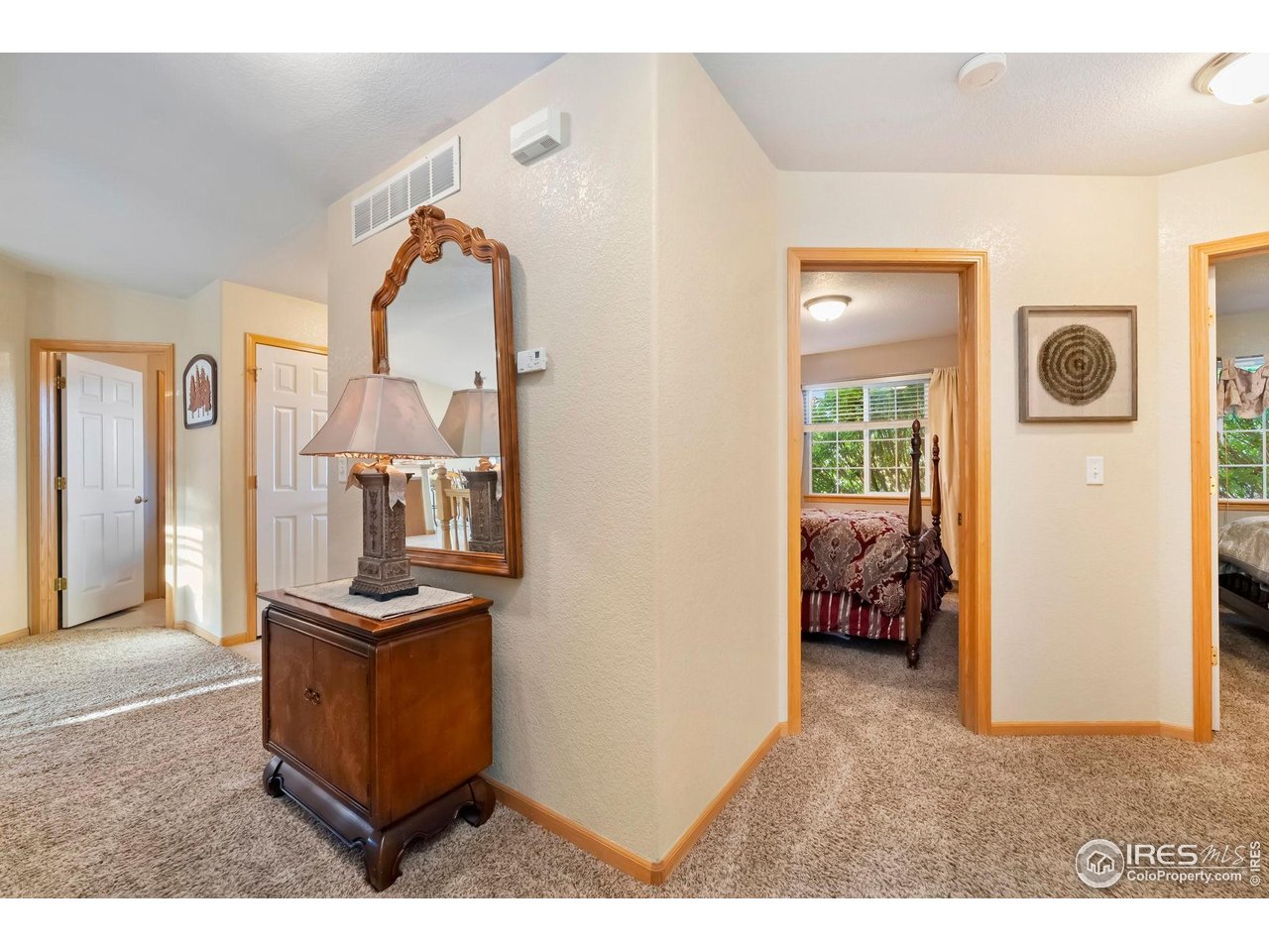 623 Foxtail Way Severance, CO 80550 - Photo 19 of 27 a view of living room and bedroom