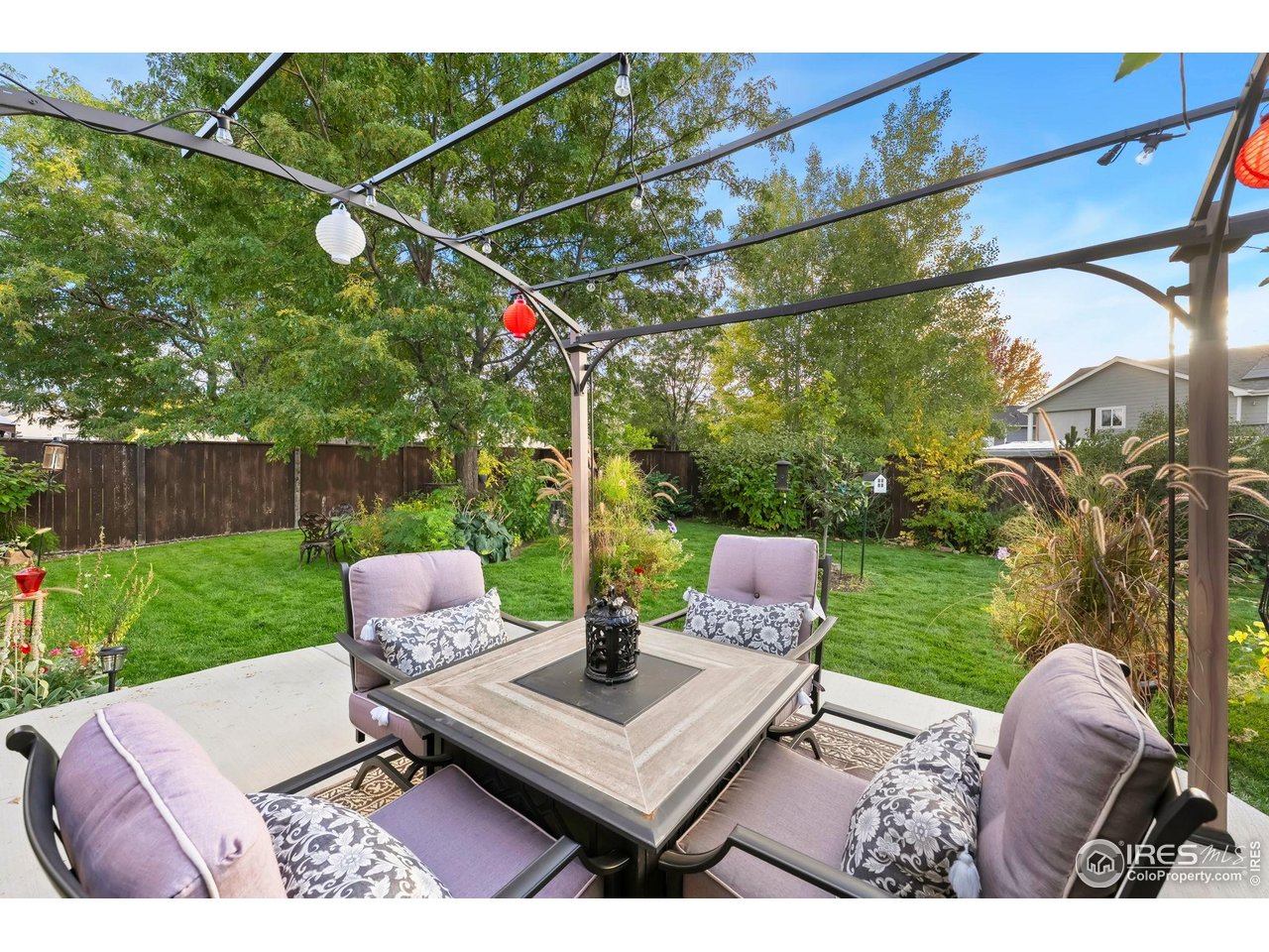 623 Foxtail Way Severance, CO 80550 - Photo 25 of 27 a backyard of a house with outdoor seating