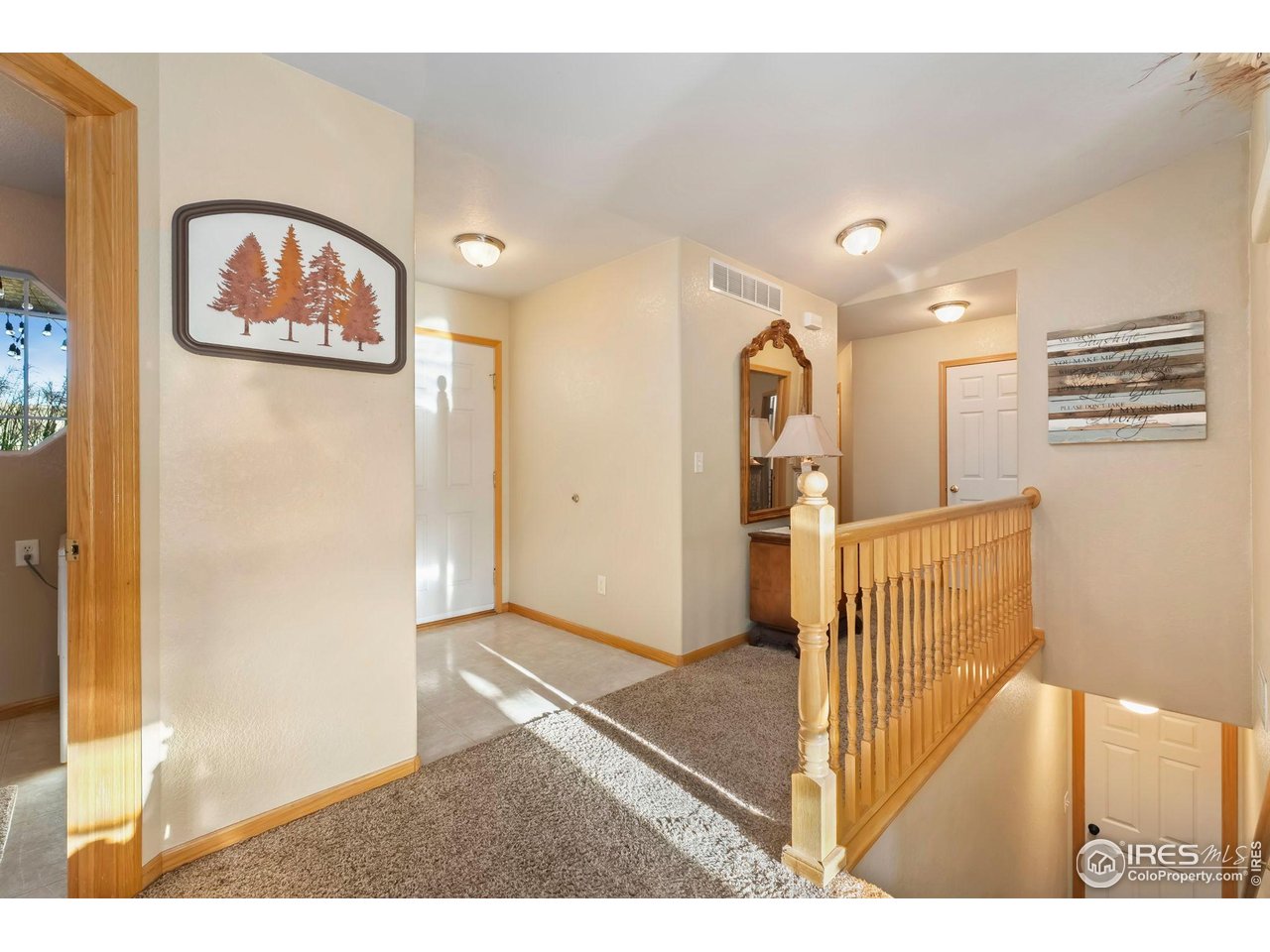 623 Foxtail Way Severance, CO 80550 - Photo 7 of 27 a view of a hallway view with staircase