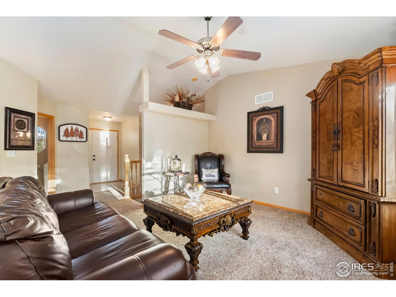 623 Foxtail Way Severance, CO 80550 - Photo 9 of 27 a living room with furniture