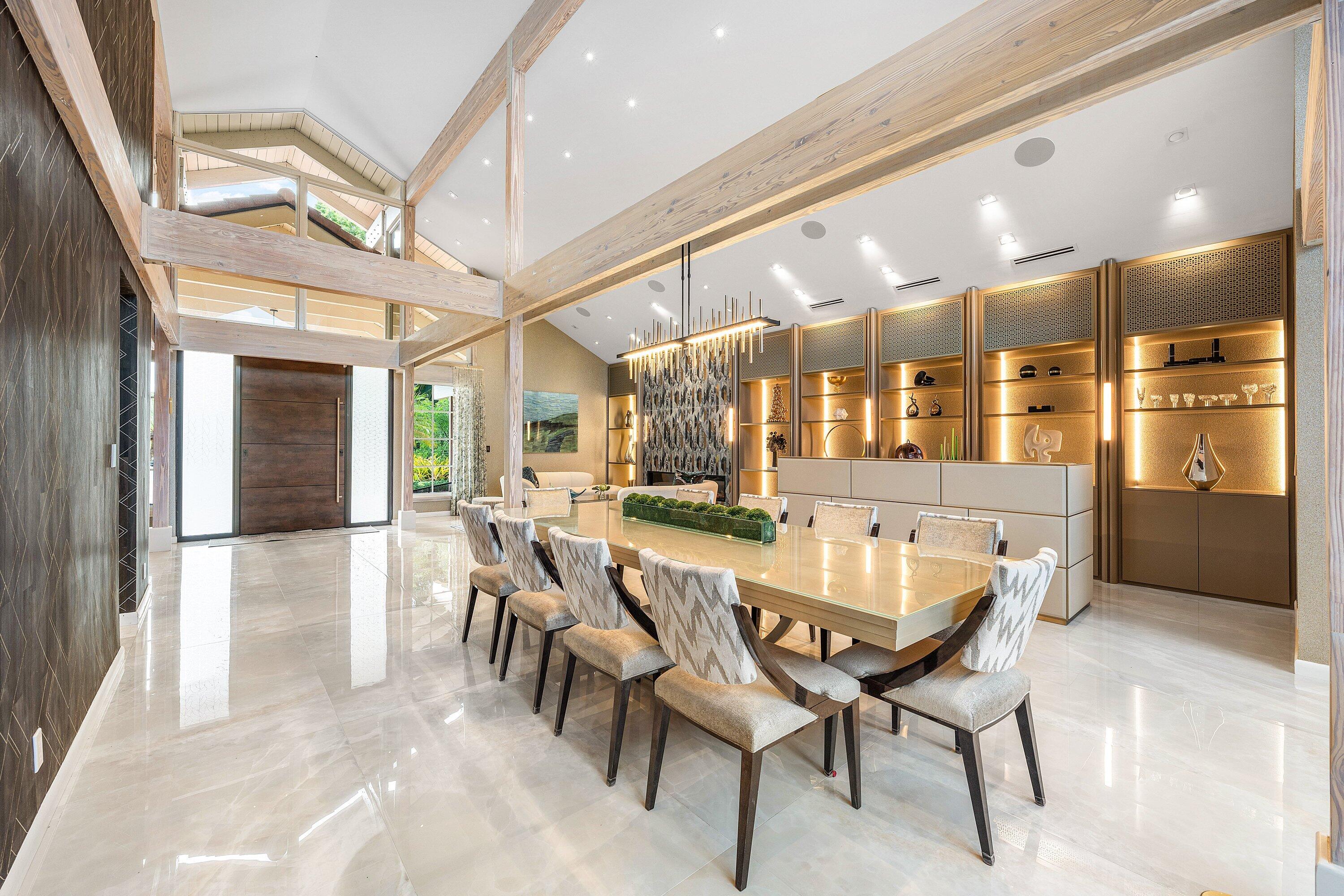 6641 Giralda Circle Boca Raton, FL 33433 - Photo 16 of 116 a dining hall with stainless steel appliances kitchen island granite countertop a dining table and chairs