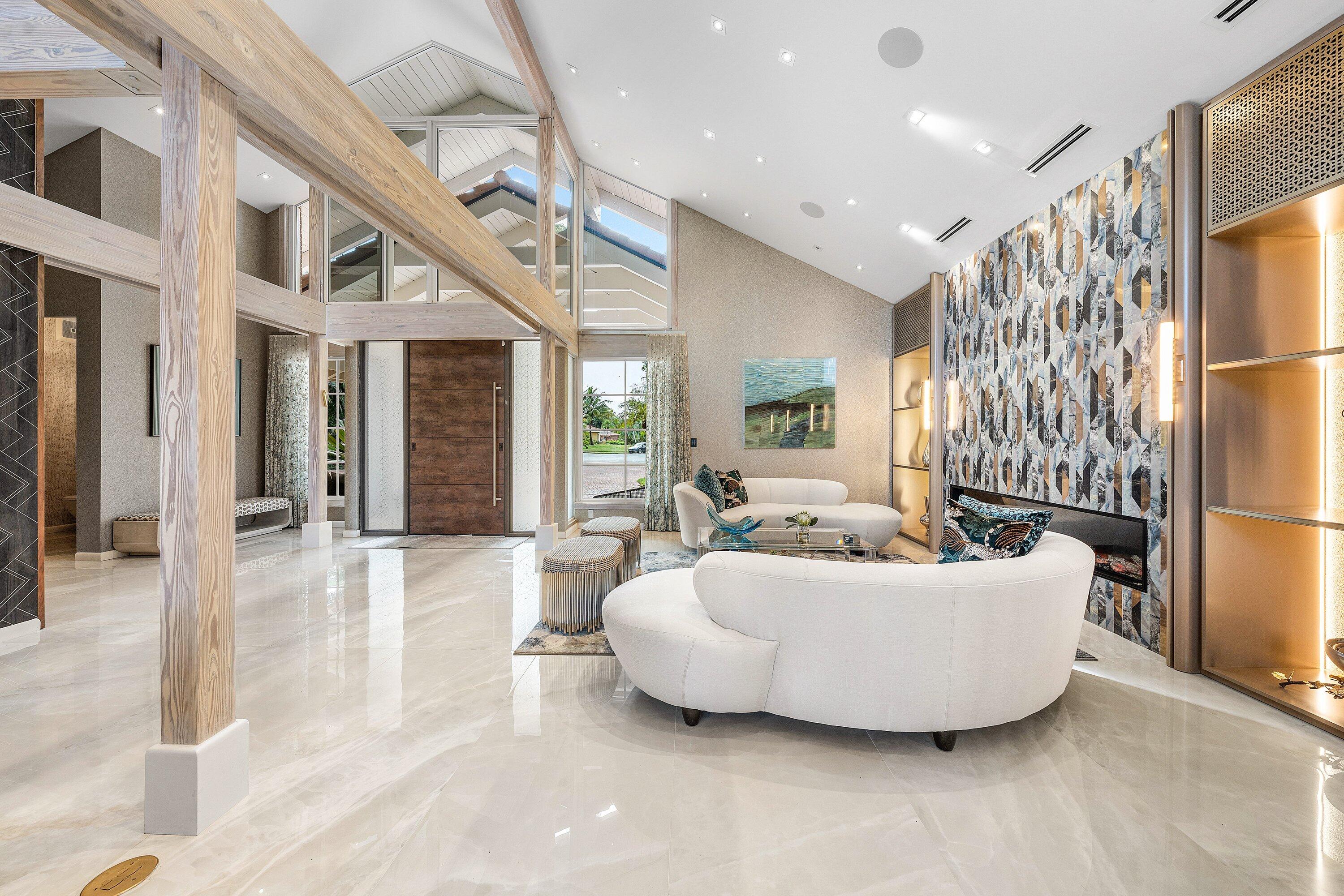 6641 Giralda Circle Boca Raton, FL 33433 - Photo 19 of 116 a living room with furniture and a large window