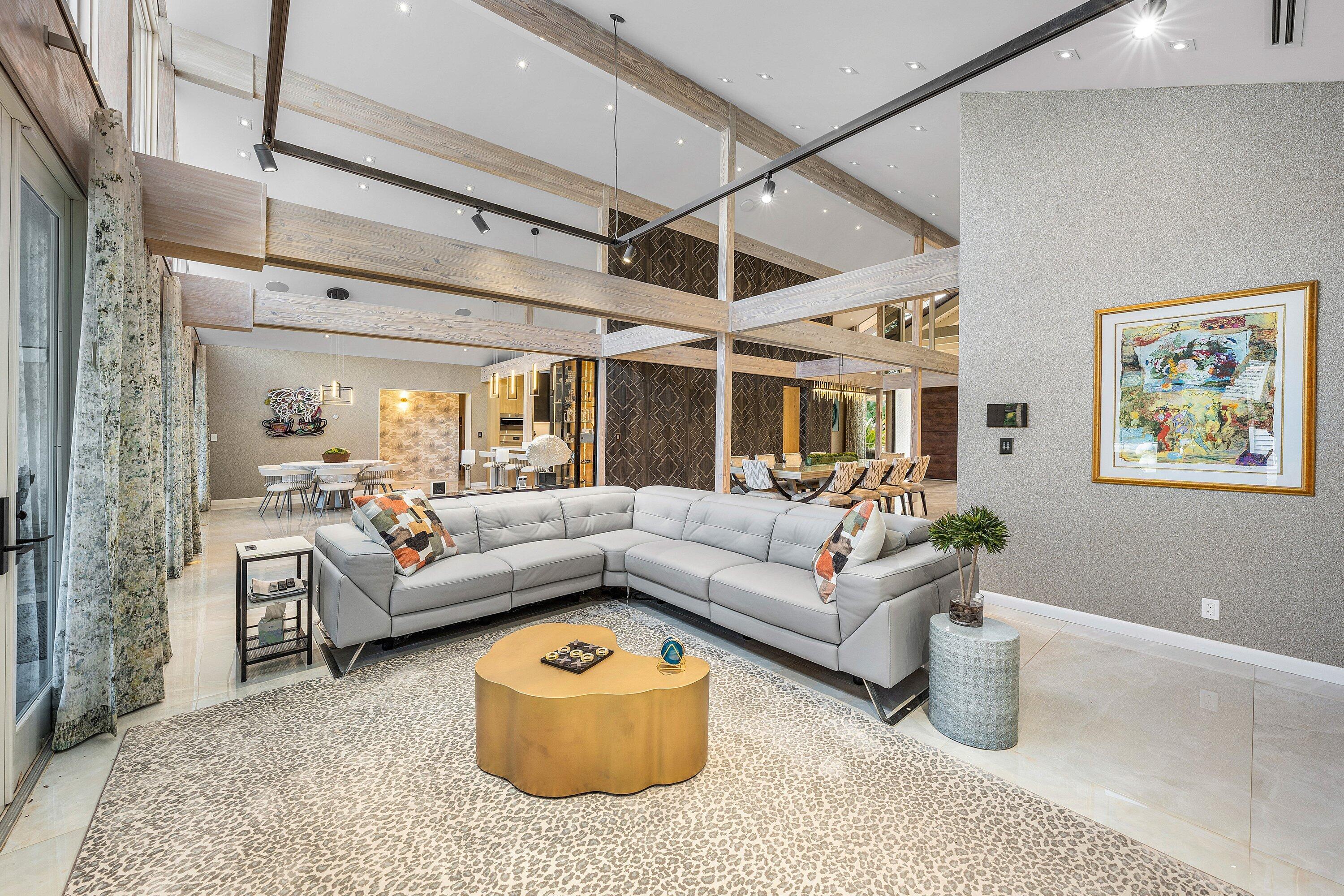 6641 Giralda Circle Boca Raton, FL 33433 - Photo 23 of 116 a living room with furniture and a large window