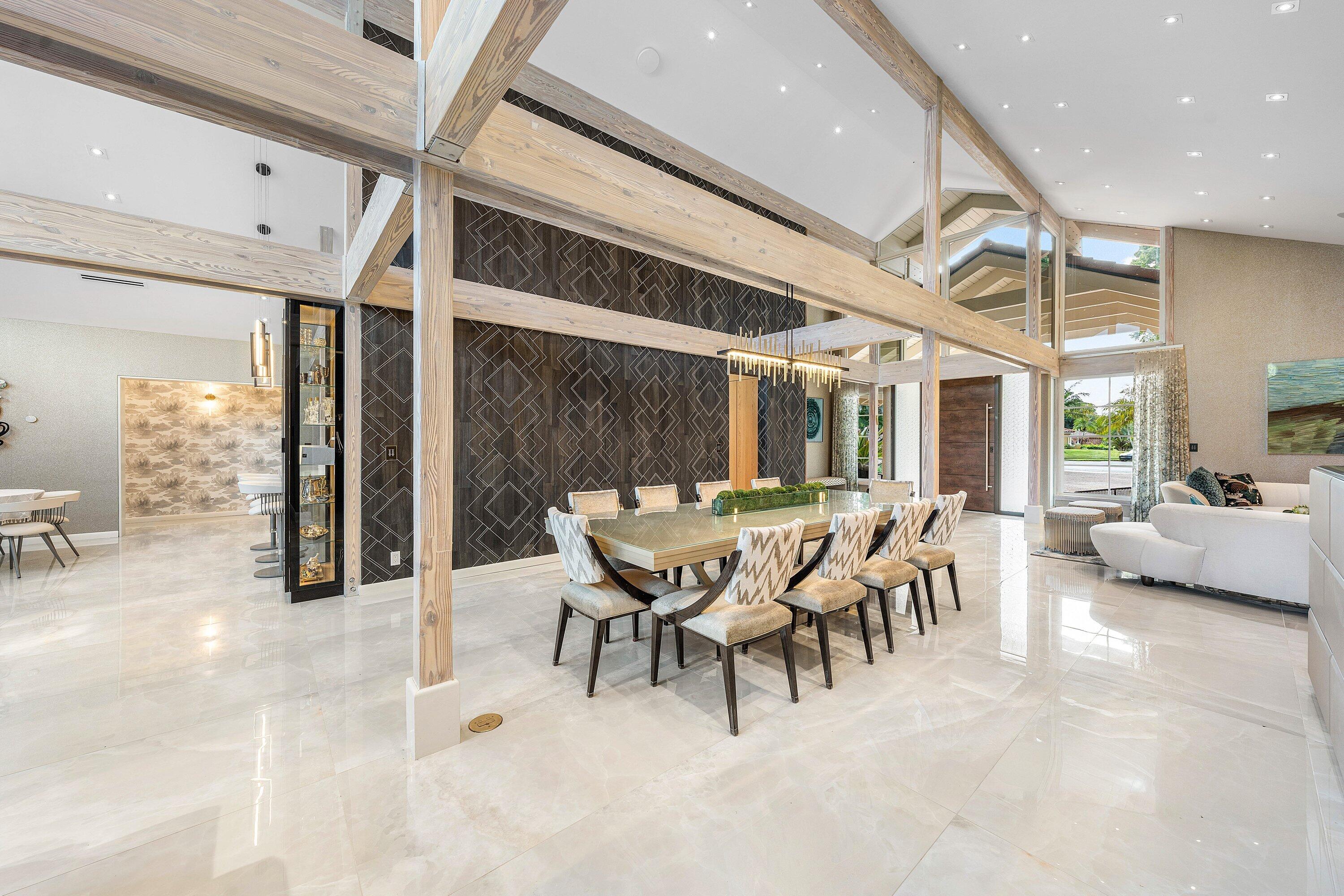 6641 Giralda Circle Boca Raton, FL 33433 - Photo 24 of 116 a dining room with furniture and a large window