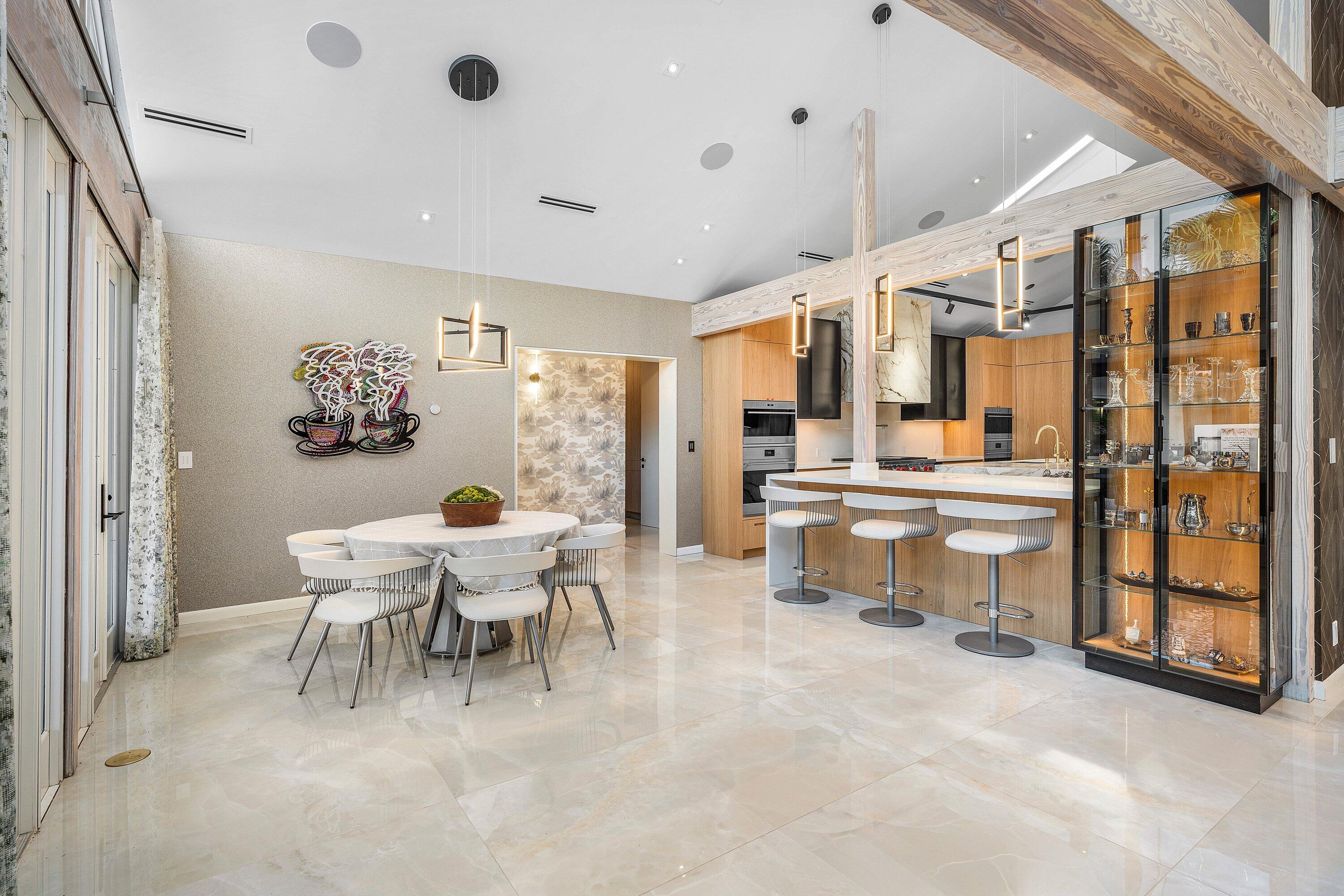 6641 Giralda Circle Boca Raton, FL 33433 - Photo 25 of 116 a view of a dining room with furniture a chandelier and window