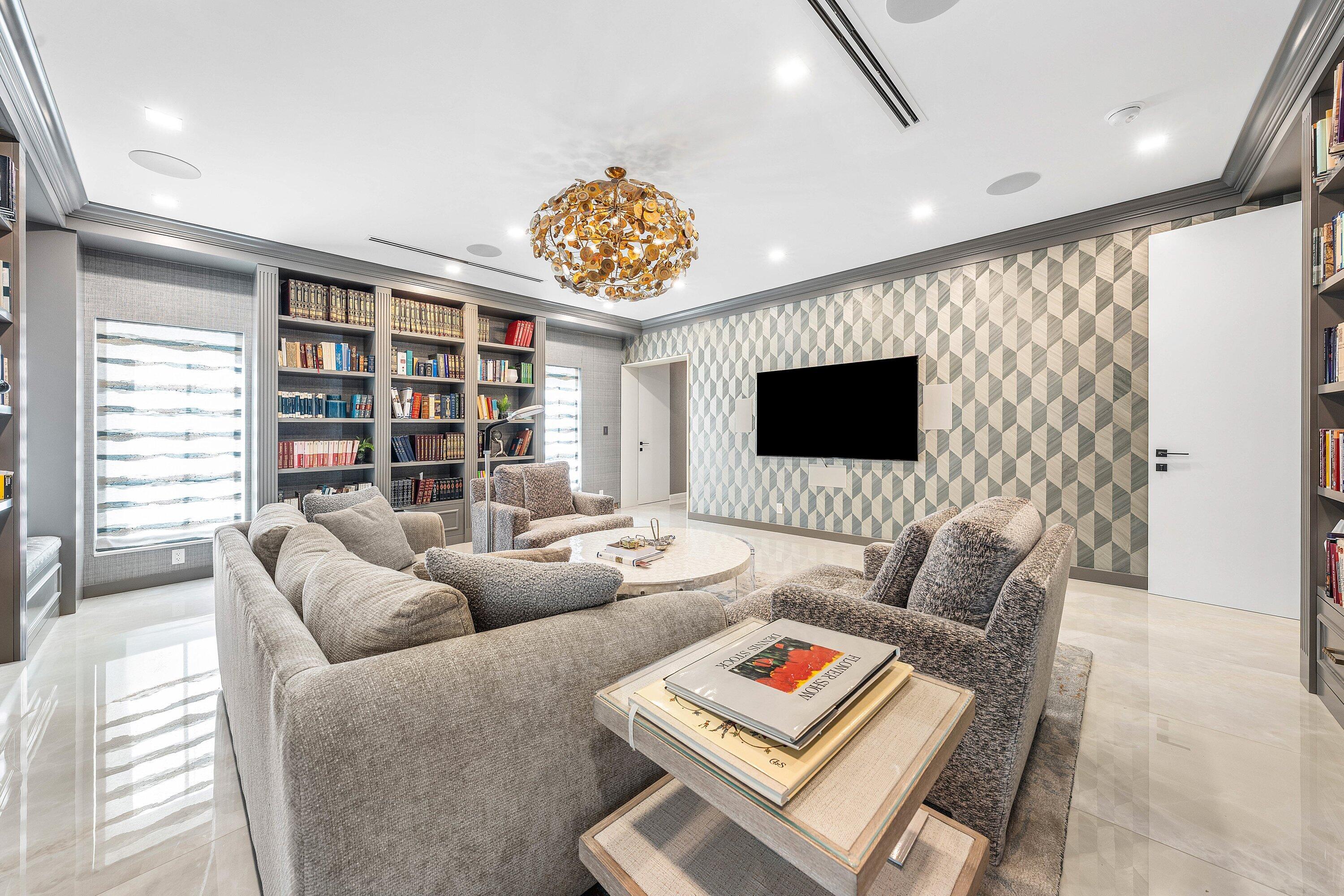 6641 Giralda Circle Boca Raton, FL 33433 - Photo 35 of 116 a living room with furniture and a flat screen tv