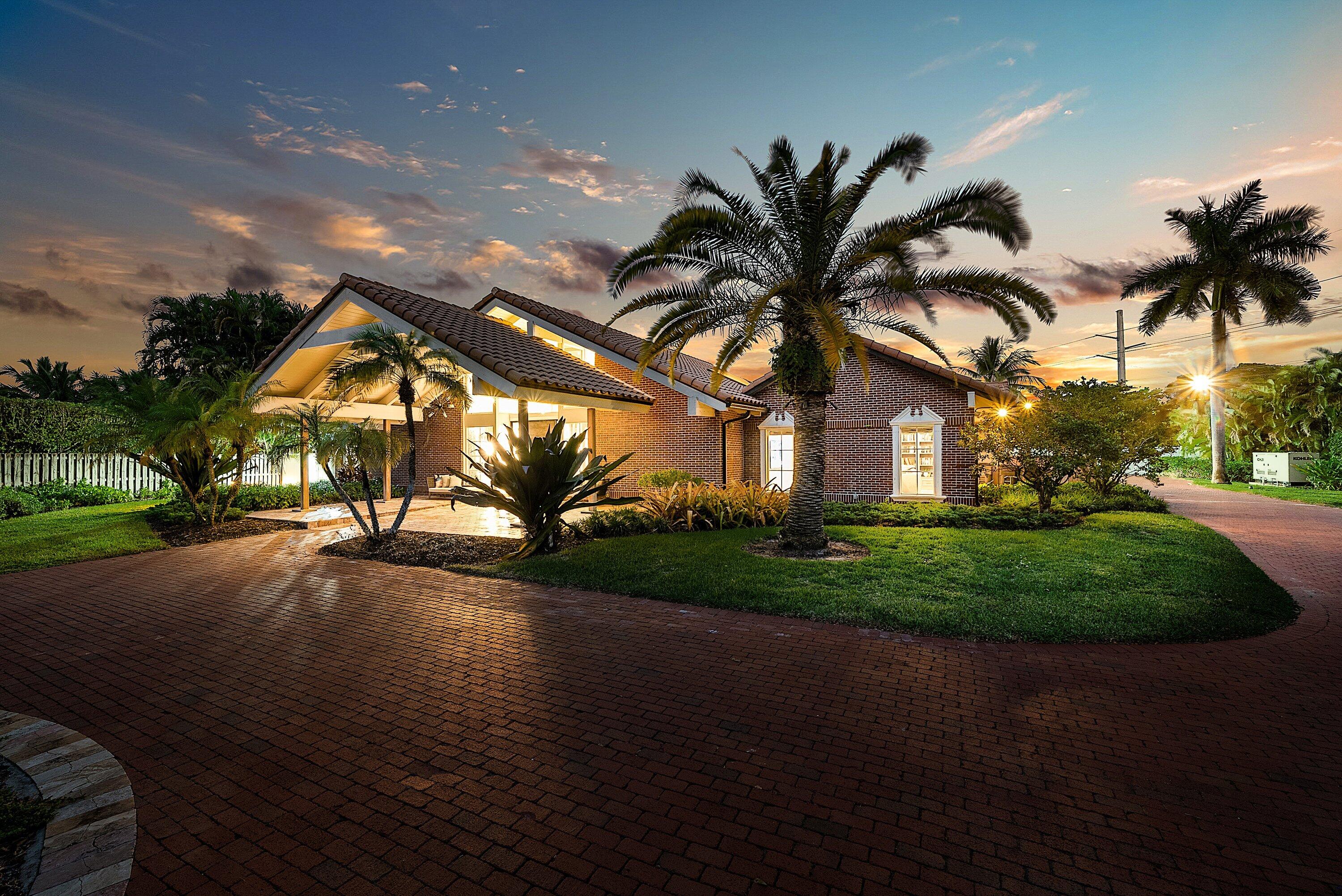 6641 Giralda Circle Boca Raton, FL 33433 - Photo 4 of 116 a view of a house with a yard and garage