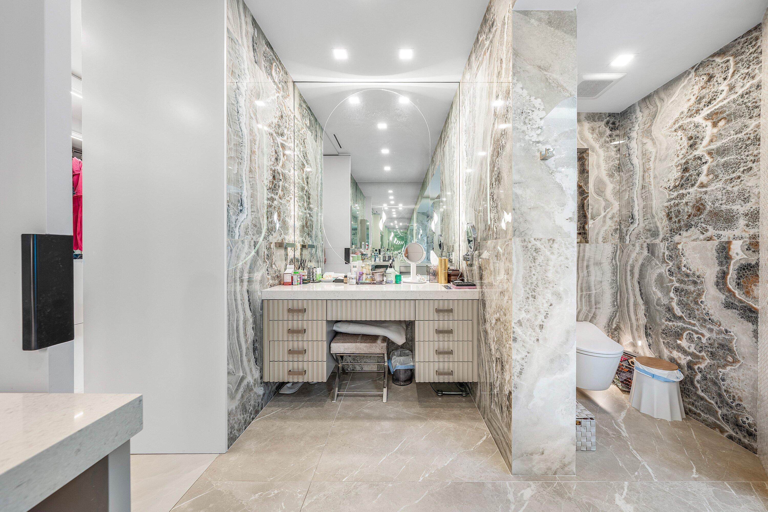 6641 Giralda Circle Boca Raton, FL 33433 - Photo 53 of 116 a bathroom with a sink a toilet a shower and a mirror