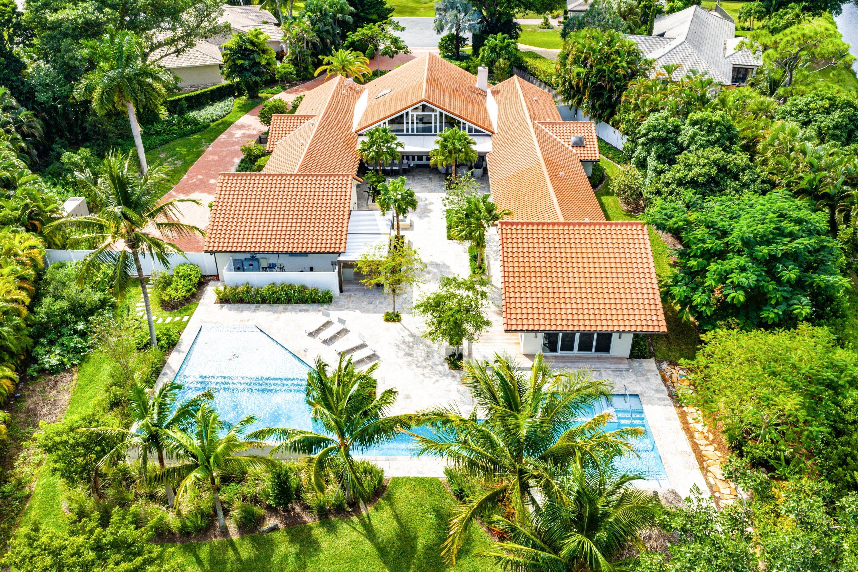 6641 Giralda Circle Boca Raton, FL 33433 - Photo 7 of 116 an aerial view of house with yard and swimming pool