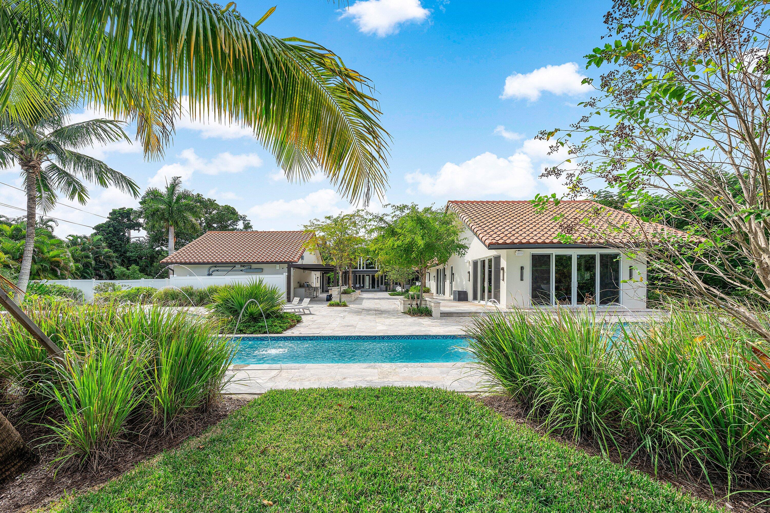 6641 Giralda Circle Boca Raton, FL 33433 - Photo 87 of 116 a front view of house with yard and green space