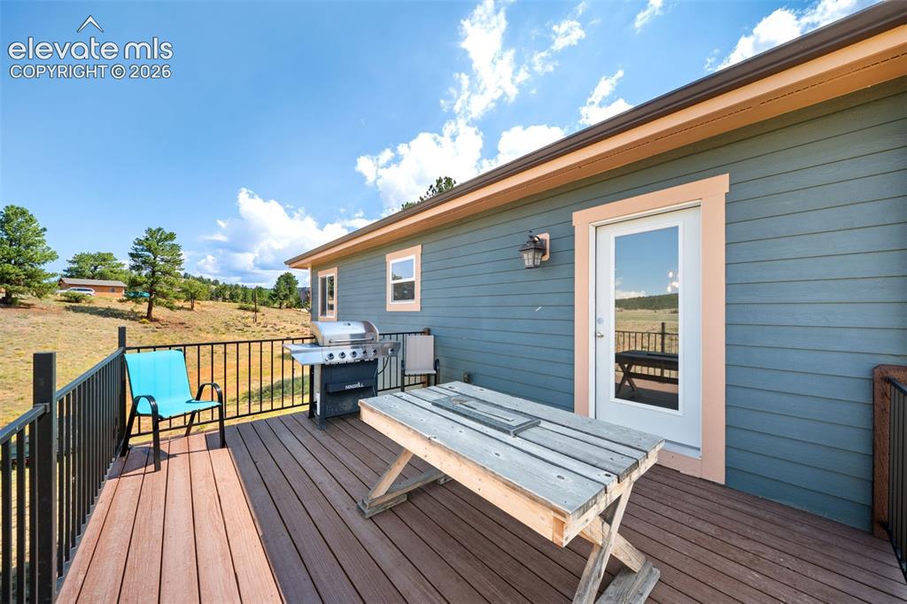 351 High Pasture Road Florissant, CO 80816 - Photo 26 of 39 Spacious rear deck, perfect for grilling and entertaining.