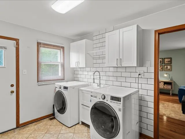 a utility room with dryer and washer