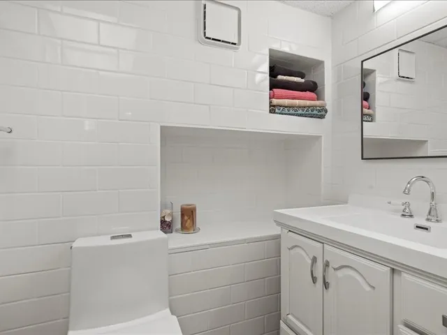 a bathroom with a sink and a shower