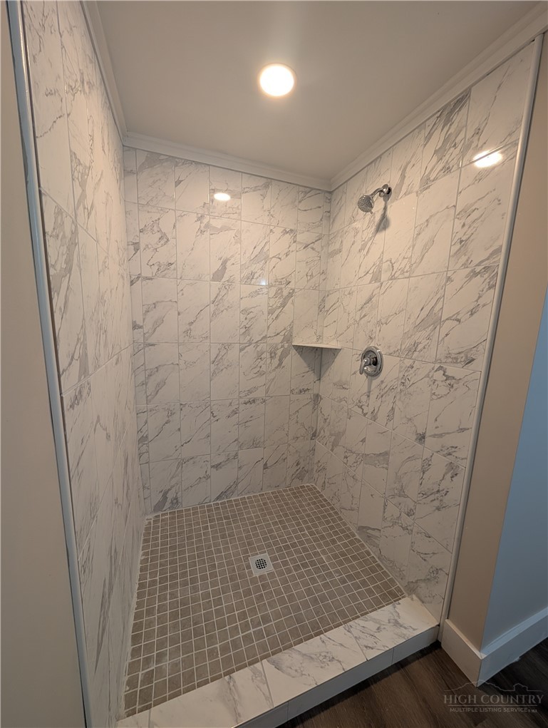 68 Estep Street Sparta, NC 28675 - Photo 20 of 21 a bathroom with a shower