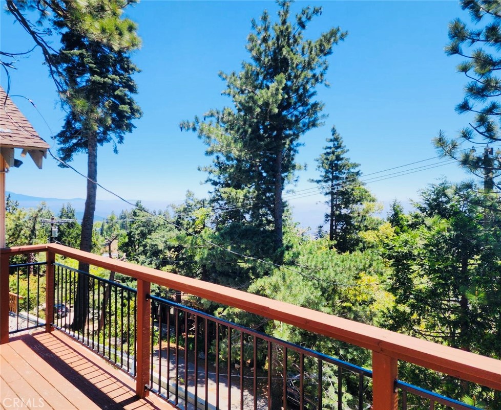 a balcony with an outdoor space