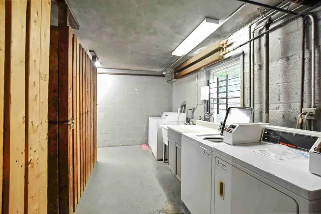 a view of bathroom with dual sinks