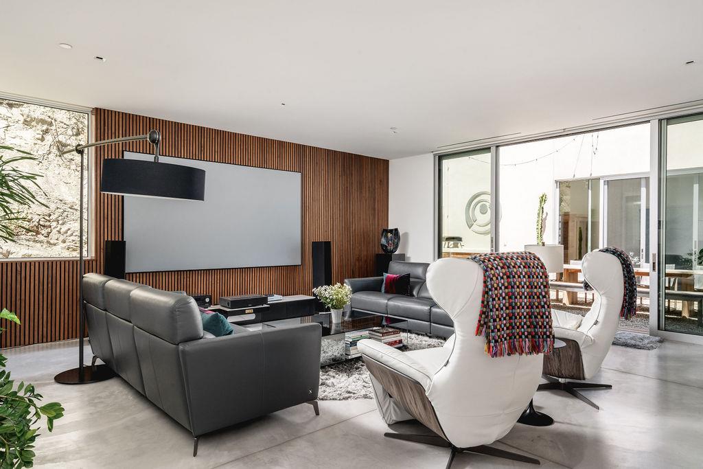1465 Foothill Road Ojai, CA 93023 - Photo 24 of 33 a living room with furniture and a floor to ceiling window