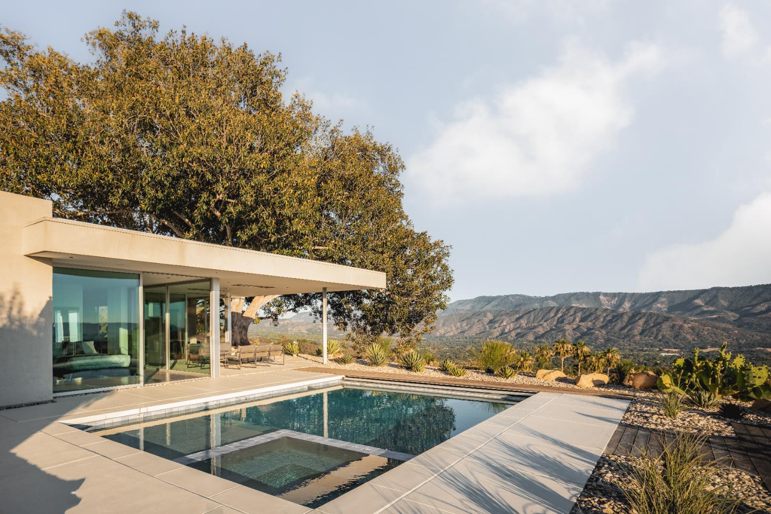 1465 Foothill Road Ojai, CA 93023 - Photo 4 of 33 a view of a swimming pool with a lounge chair