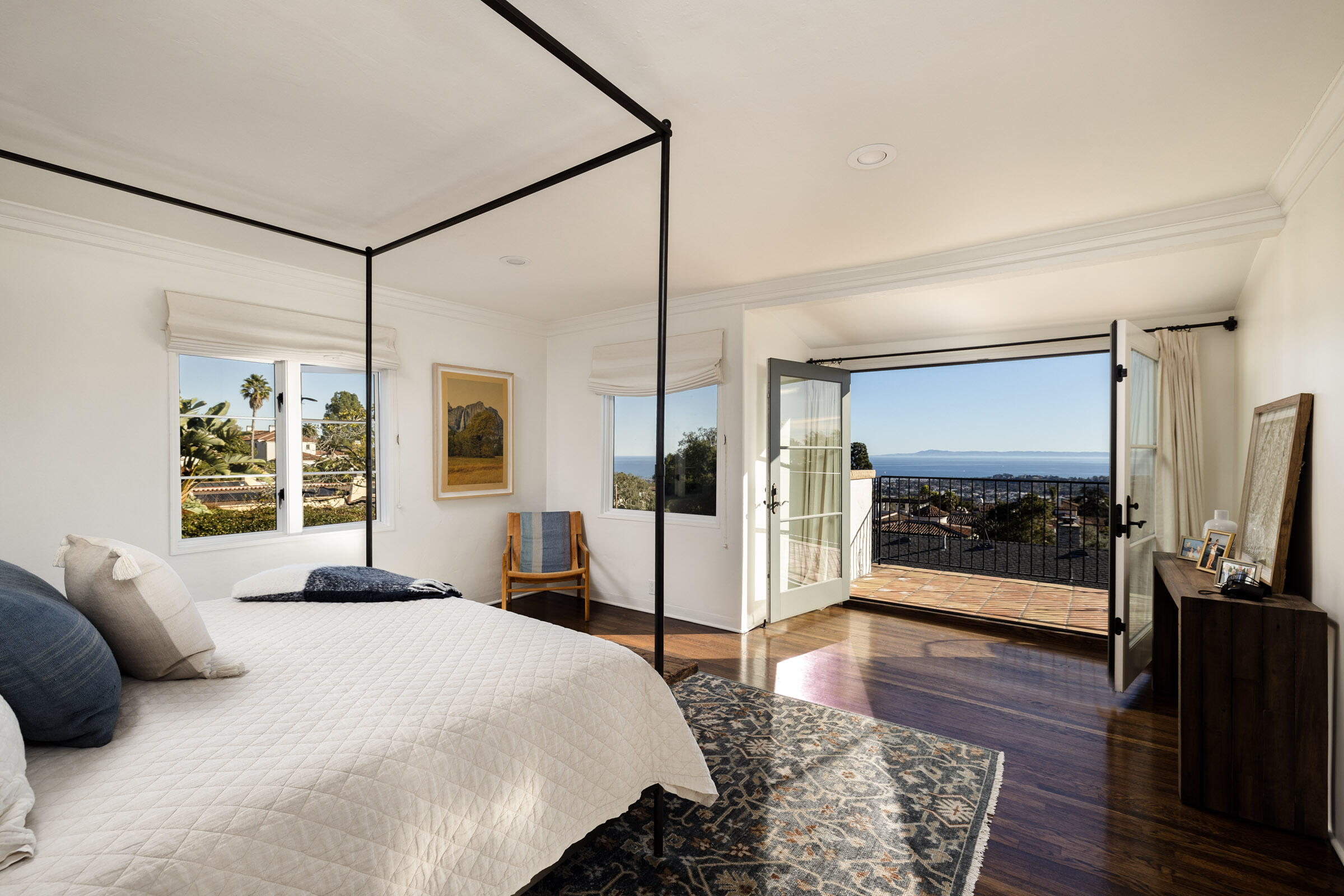 1933 Mission Ridge Road Santa Barbara, CA 93103 - Photo 14 of 30 a bedroom with a large bed and a large window