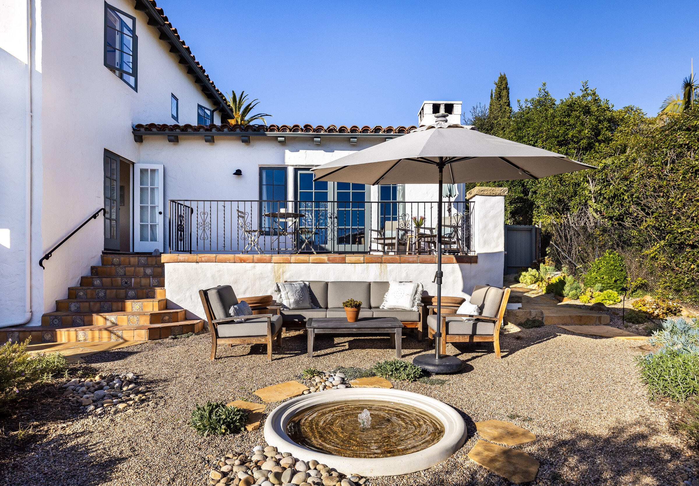 1933 Mission Ridge Road Santa Barbara, CA 93103 - Photo 24 of 30 a view of a patio with swimming pool table and chairs