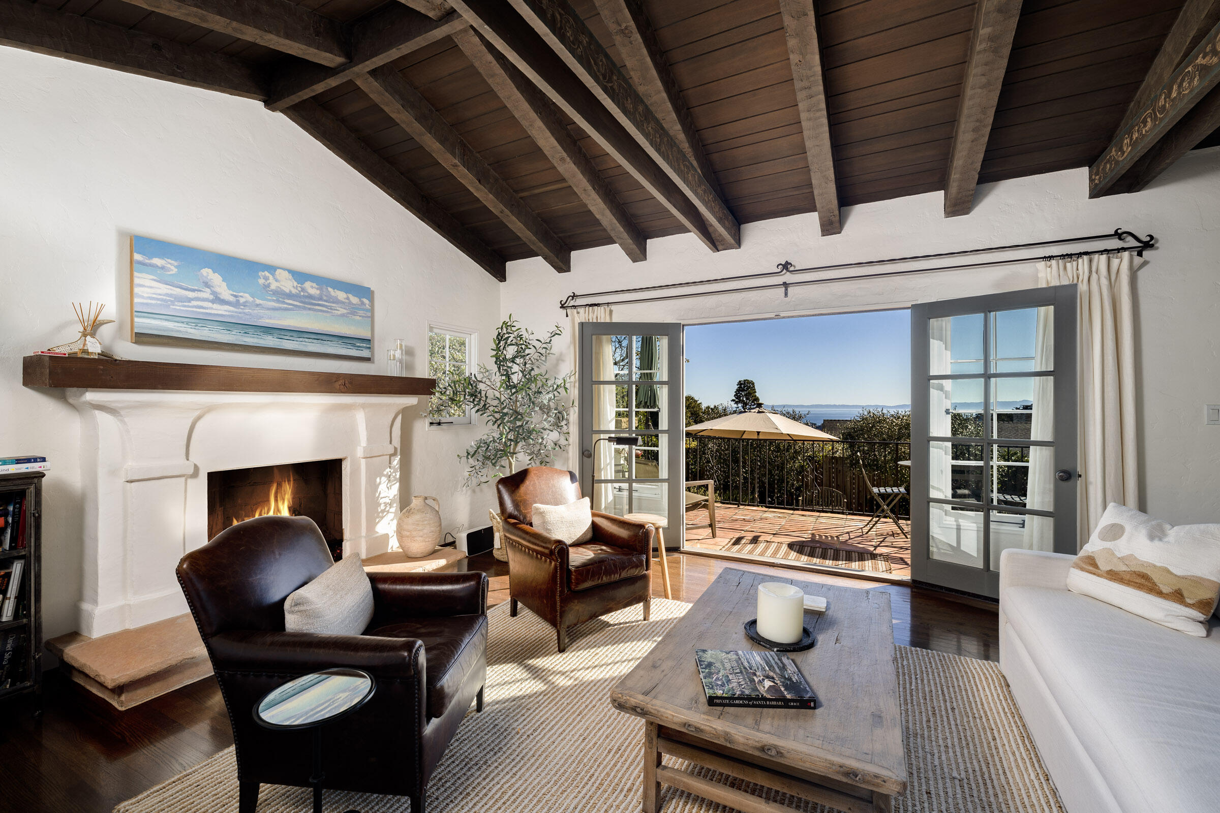 1933 Mission Ridge Road Santa Barbara, CA 93103 - Photo 3 of 30 a living room with furniture a fireplace and a table