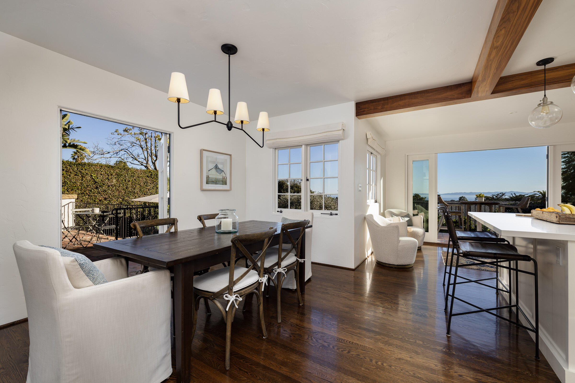1933 Mission Ridge Road Santa Barbara, CA 93103 - Photo 5 of 30 a view of a dining room with furniture and wooden floor
