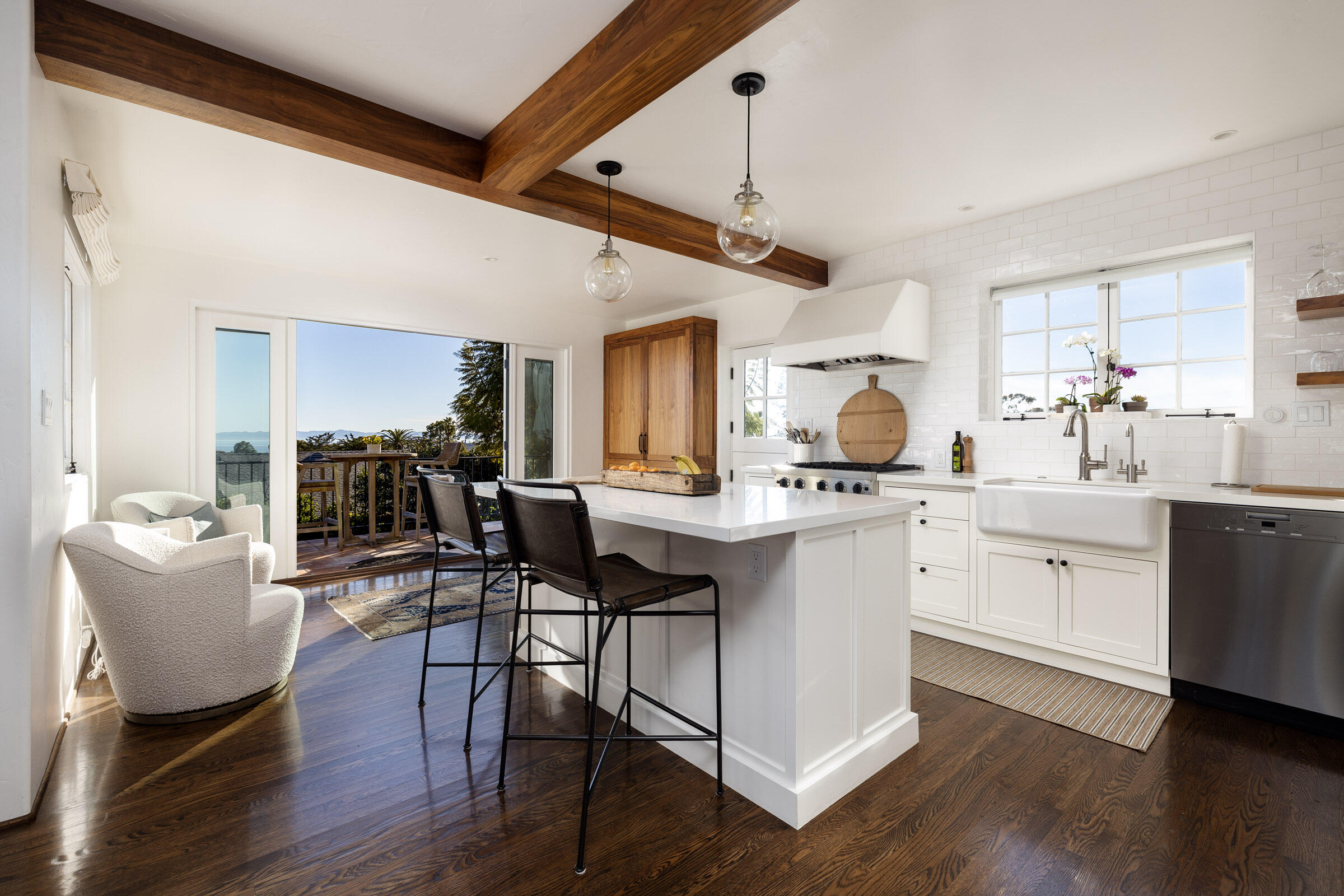 1933 Mission Ridge Road Santa Barbara, CA 93103 - Photo 6 of 30 a kitchen with a table chairs stove and wooden floor