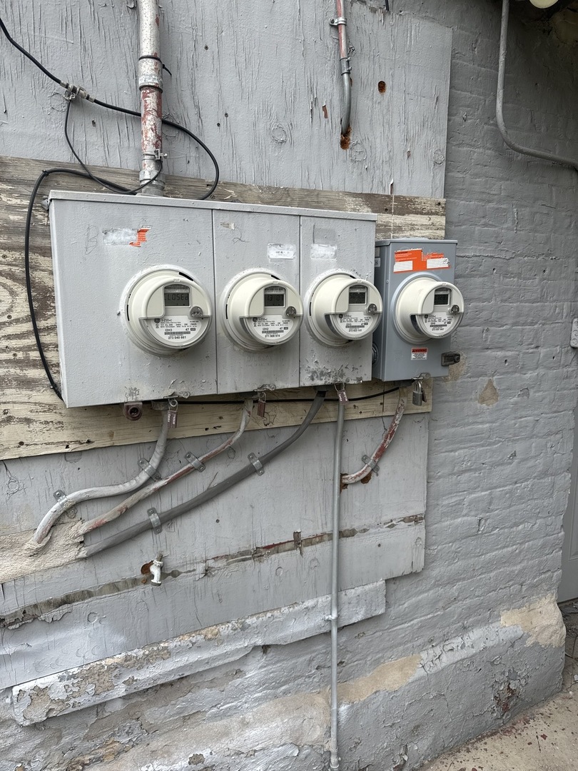 1655 South Ridgeway Avenue Chicago, IL 60623 - Photo 16 of 19 a shelf with cabinets