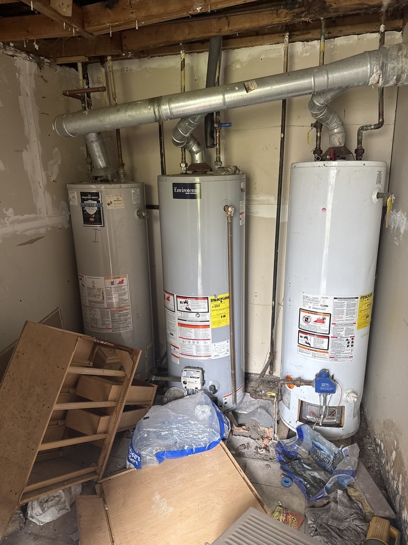 1655 South Ridgeway Avenue Chicago, IL 60623 - Photo 17 of 19 a room with storage and utility