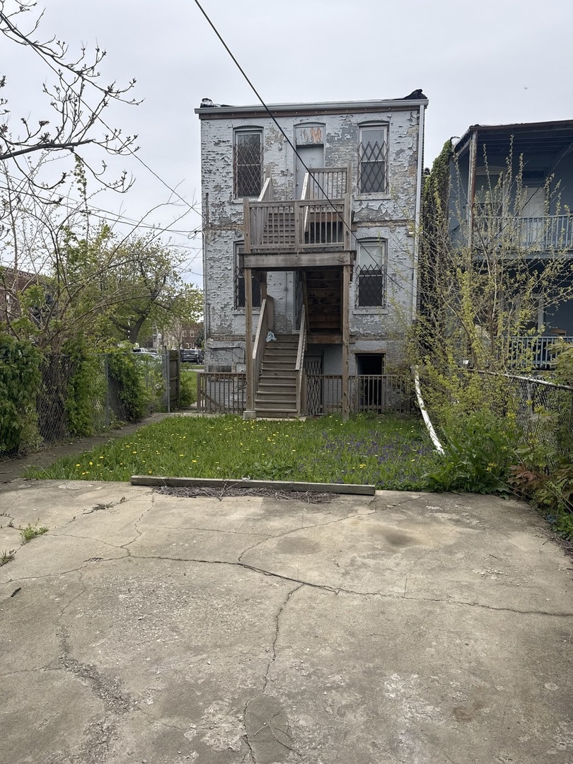 1655 South Ridgeway Avenue Chicago, IL 60623 - Photo 18 of 19 front view of house with a yard