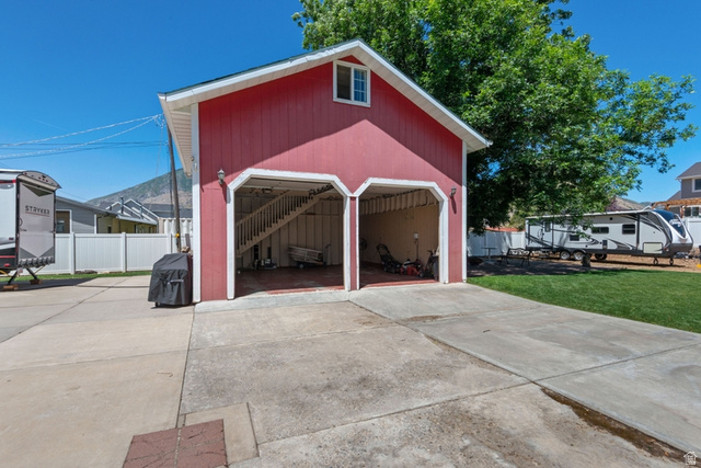 1214 North 300 West Mapleton, UT 84664 - Photo 27 of 33 Detached 25x25 two car detached garage with loft upstairs. Over size ceilings and insulated garage doors.