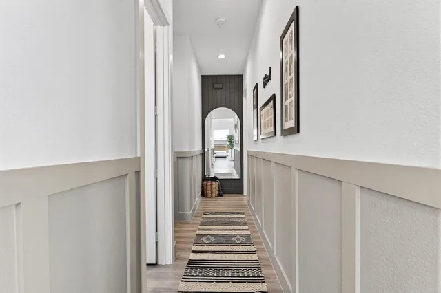 a view of a hallway view with staircase