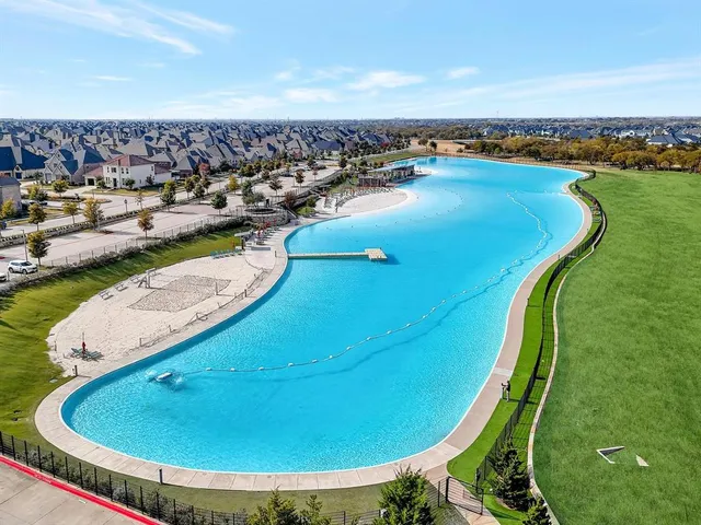 a view of a lake with a city
