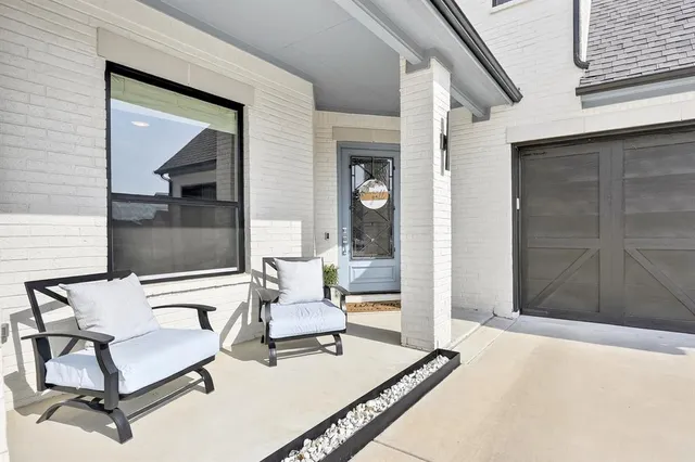 a building outdoor space with patio furniture