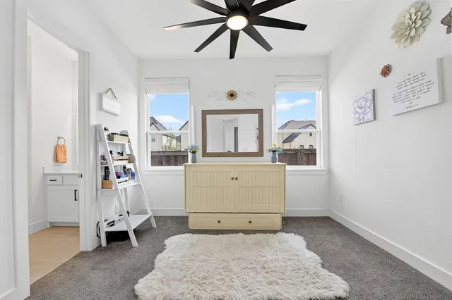 a room with a dresser and gym equipment