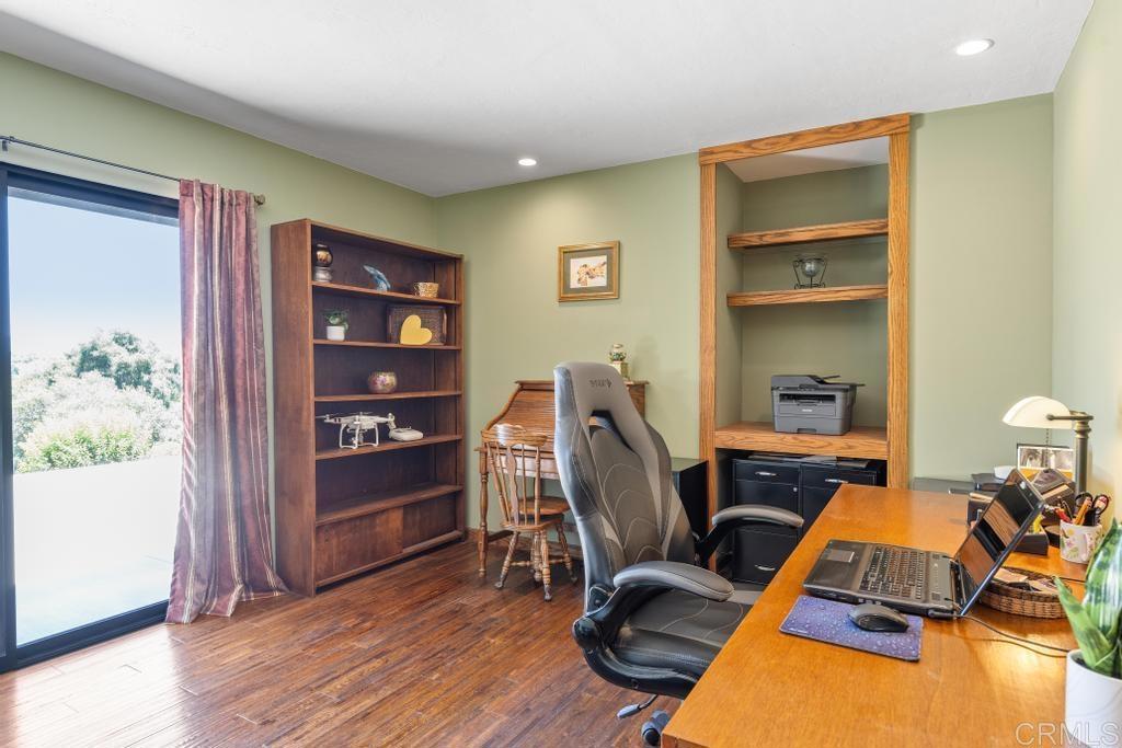 1057 Riverview Drive Fallbrook, CA 92028 - Photo 19 of 69 a view of a workspace with furniture and wooden floor