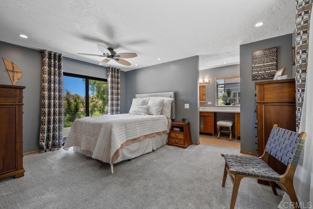 1057 Riverview Drive Fallbrook, CA 92028 - Photo 27 of 69 a bed room with a bed and a chair