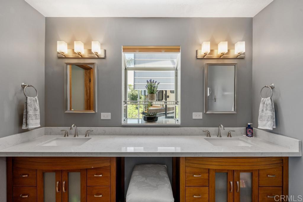1057 Riverview Drive Fallbrook, CA 92028 - Photo 29 of 69 a bathroom with a sink and a mirror
