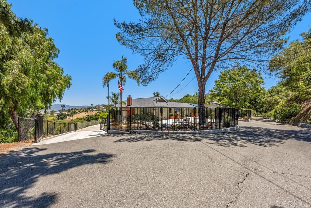 1057 Riverview Drive Fallbrook, CA 92028 - Photo 45 of 69 a view of a house with a tree in front